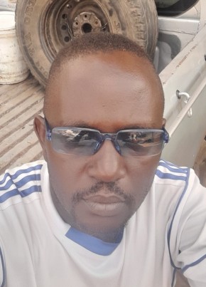 Alex Mwanguhya, 39, Uganda, Fort Portal