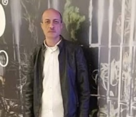 Magdy, 50, Cairo