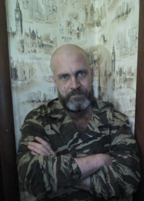 николай