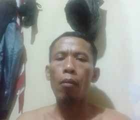 Riski, 47, Jakarta