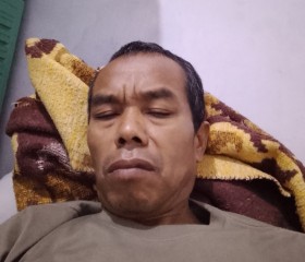 Ua Sudrajat, 55, Jakarta