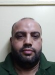 Mustafa, 44  , Al Jizah