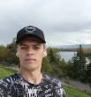 Август