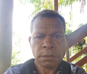 Jerry Yake, 18, Jayapura