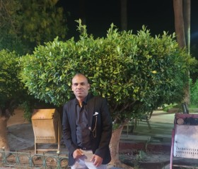 Adel, 46, Cairo