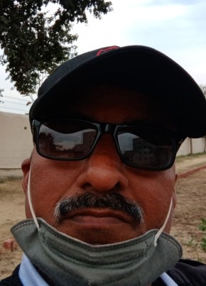 Naveen Mishra, 46, India, Khurja