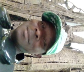 Richard Menegbe, 45, Abobo