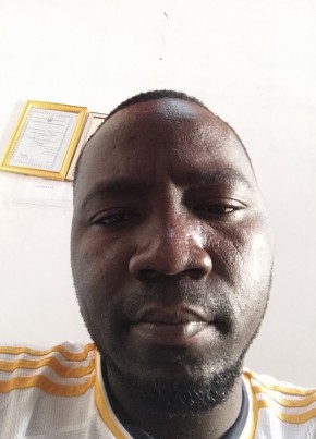 Heneliko, 29, Tanzania, Dar es Salaam