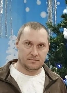 Николай