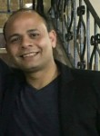 Taher, 34  , Cairo
