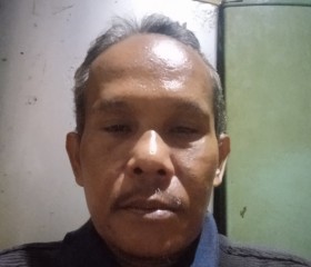 Iman kuntoyo, 54, Jakarta