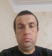 Али
