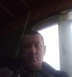 Николай