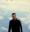 Али