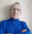 николай