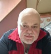 николай