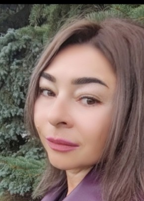 Оля