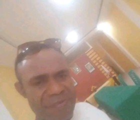 Bernard Boja, 42, Jayapura