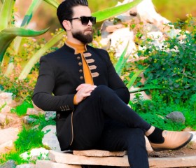 Taha, 30, Mosul