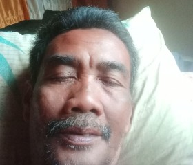 Hadi, 46, Kualatungkal