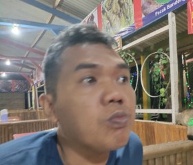Lemen Sulaiman, 45, Jakarta