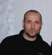 Роман Торан