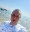 Николай
