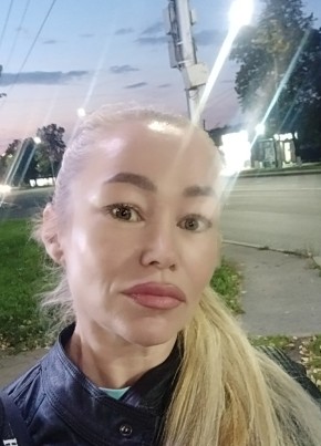 Оля