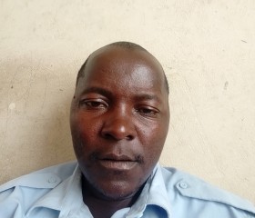 Johnpoul, 43, Kigali