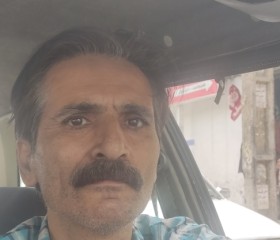 Ali, 51, Tehran