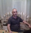 николай
