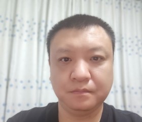 张虎, 46, Qingdao