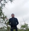 Комил