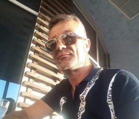 LANDI, 47, Korce