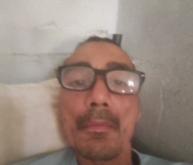 Rachid Mezgche, 51, Annaba