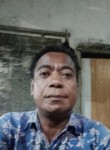 Arianto, 40, Palu