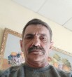 николай