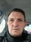Igor Shkindiruk, 45, Minsk