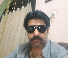 Farhan Munair, 41, Lahore