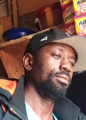 Turay Momodu, 43, Sierra Leone, Freetown