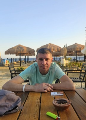 Николай