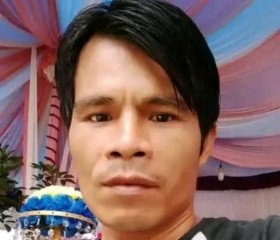 Junaidi, 50, Padang