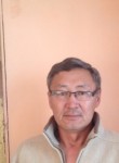май-оол, 52 года
