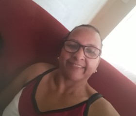 Luiza, 57, Americana