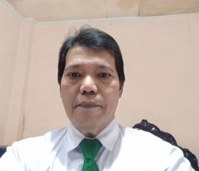 Teddy Simanjunta, 60, Bandung