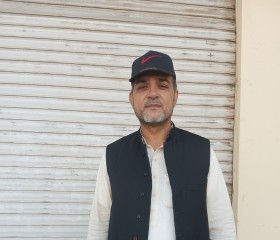 Dr. Tahir, 57, Gujrat