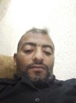 Walid, 43, Masakin
