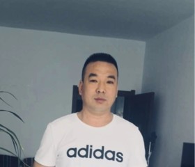 Dong, 55, Harbin