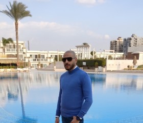 Alaa Tal2a, 42, Cairo