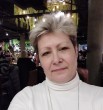 Мила